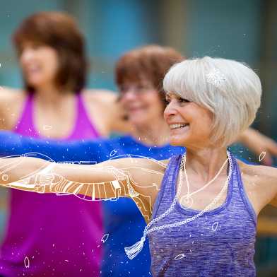 A group of senior adult women are taking a yoga class together at the gym